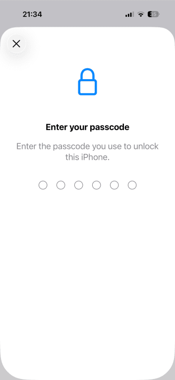 iPhone asking for passcode to confirm software update request.