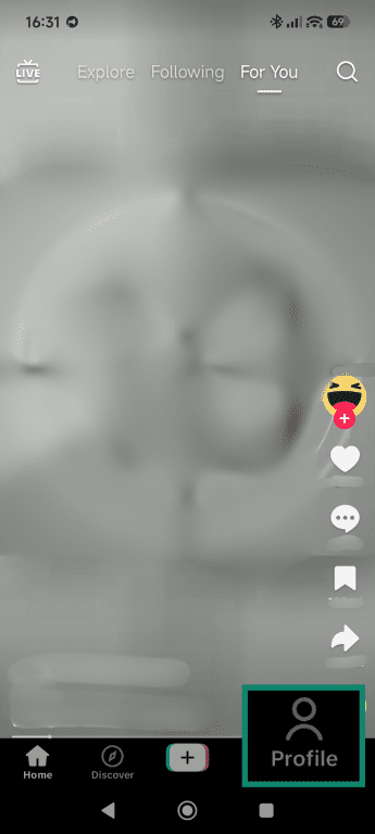 TikTok main feed, highlighting the Profile navigation button.
